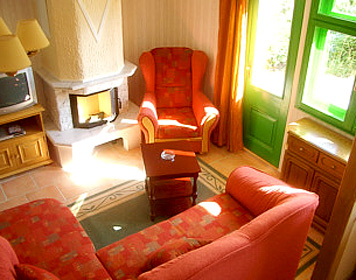 Ferienhaus Seute Deern - Wohnzimmer mit Kamin